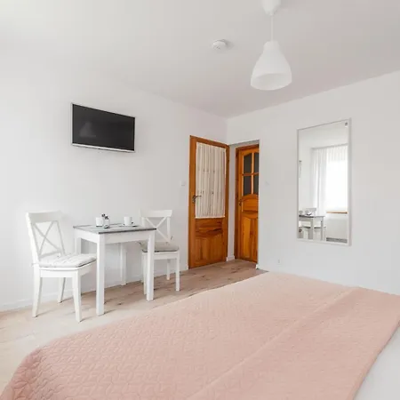 Quarto em Acomodações Particulares Pawel Jakubik